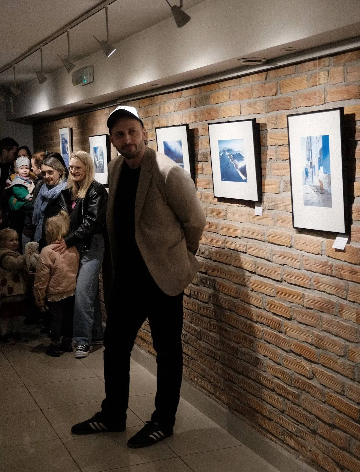 Rafał Rudko giving a speech at the exhibition opening at Galeria Anielska in Warsaw
